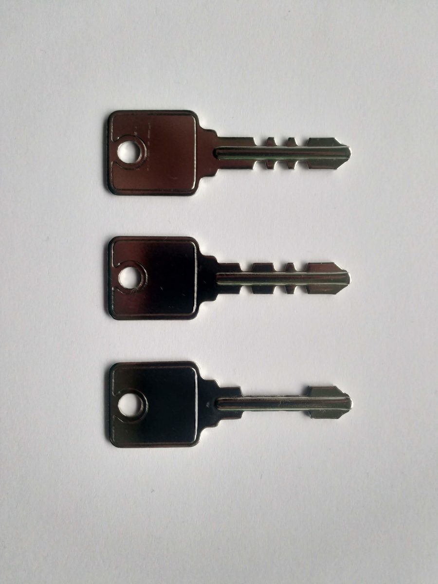 Old warded lock keys of different shapes